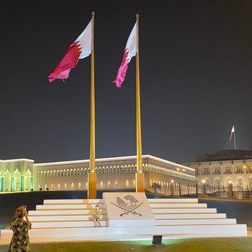 Qatari national flags outside the Amiri Diwan in Doha